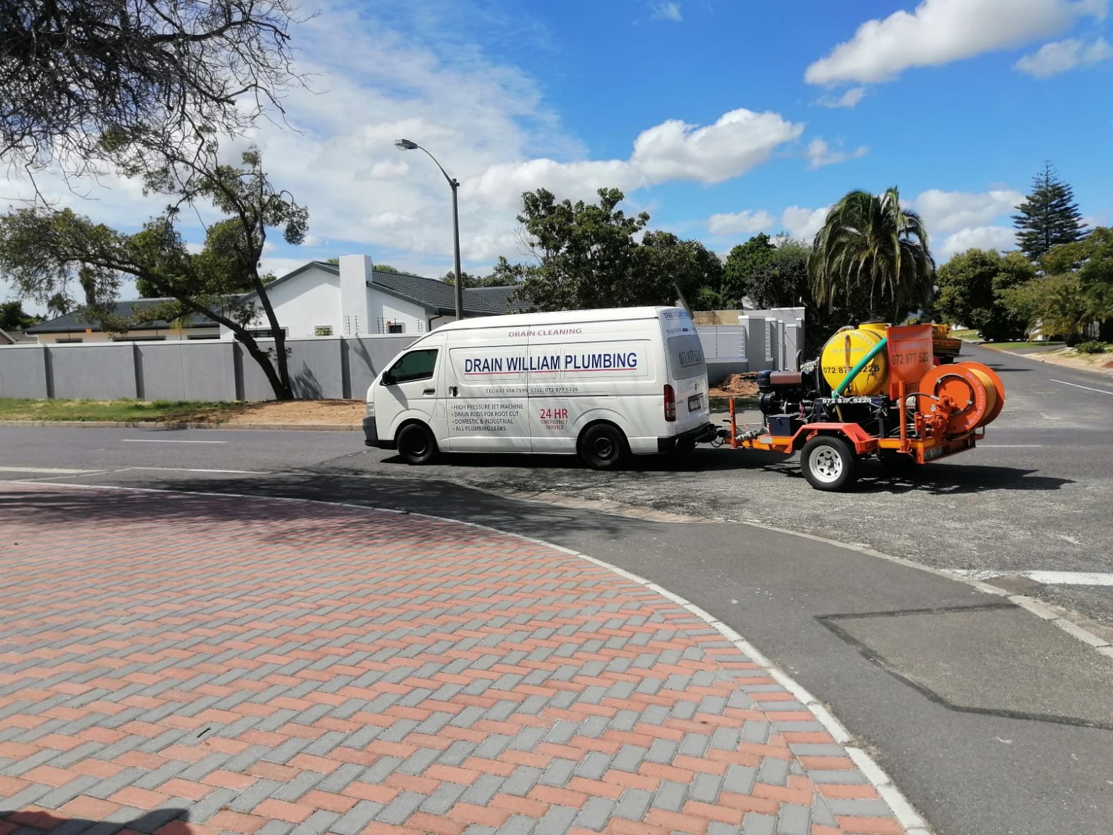 Plumber inspecting bathroom fixtures